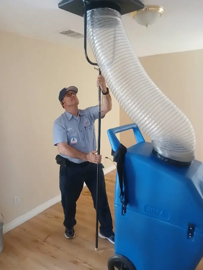 Mini Split Installation technician using HEPA equipment in Coralville